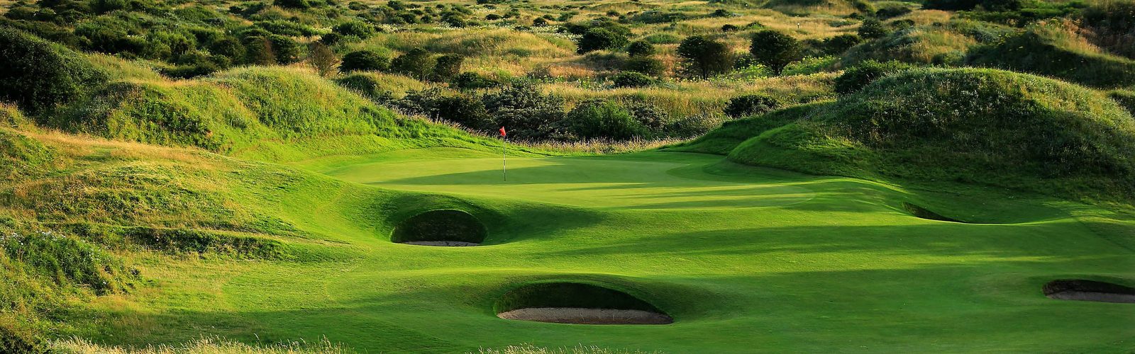 A links green and pot bunkers among the sand dunes
